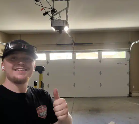 IGDS technician giving a thumbs up after a job